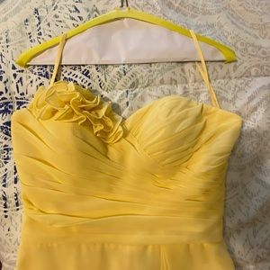 Yellow strapless, knee length bridesmaid dress